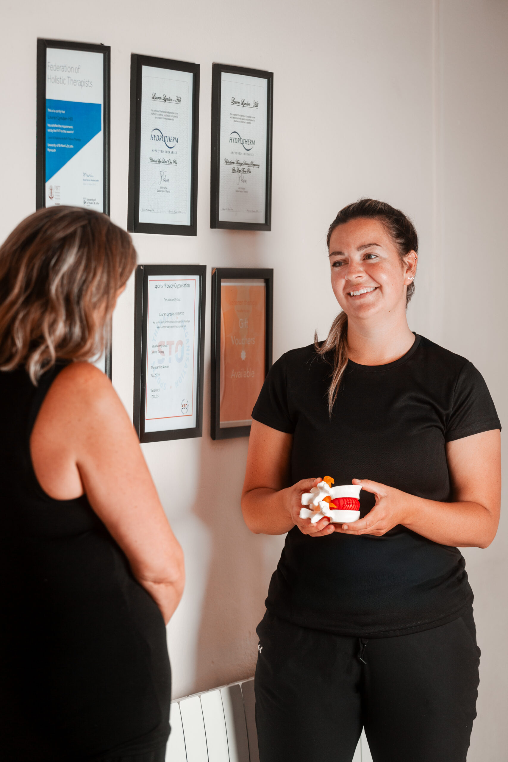 800x1066 Lauren explaining back pain